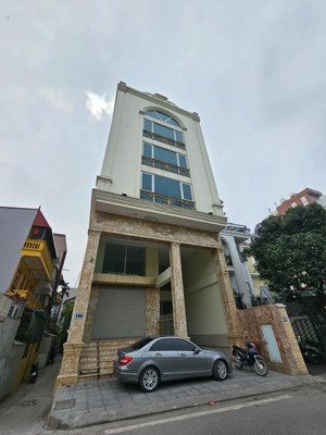 tòa nhà 7 tầng - thang máy - nội thất châu âu - hầm ô tô - lô góc