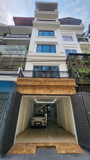 bán nhà mặt phố đông quan thông phùng chí kiên, nhà mới, hiện đại, thang máy, gara 2 ôtô