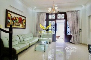 cho thuê nhà đường 64 gần tropic garden 1 trệt 1 lầu sân thượng, có sân đậu xe hơi giá 30 triệu/th