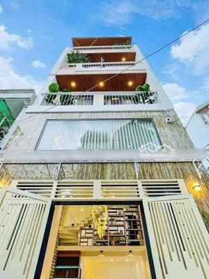 cho thuê nhà nguyên căn mới full nội thất. đường lê văn sỹ, quận 3.