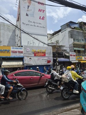 cho thuê tòa nhà mặt tiền số 10-12 đường lê quang định đối diện trường học kế bên chợ bà