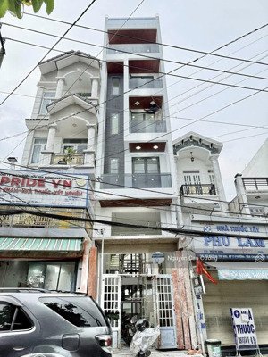 nhà mặt tiền ngay chợ 4x20m thang máy 650kg huỳnh thị hai, tân chánh hiệp, q12