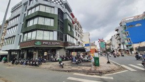 bán tòa nhà căn góc 2 mt trần hưng đạo- quận 5, 8x18, 5 tầng, hđt 200 triệu/th, giá bán 56 tỷ tl