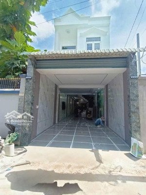 bán nhà trệt lầu ngay sau chợ dĩ an đường ô tô - kdc văn minh