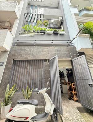 Ô TÔ ĐỖ CỬA, NHÀ MỚI 3 Tầng 4PN 48m2 (4.5 x 11.5) P12 Bình Thạnh, giá 9.x ty
