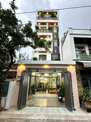 bán nhà mặt tiền đường tân thới nhất 6. dt 5x23m,4 tầng,có thang máy. giá : 12,5 tỷ