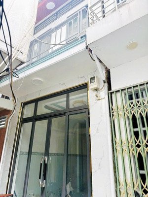 tôi bán nhà 42 m2, 1 trệt.1 lầu đúc, 2 pn, 2 wc, tuyệt đẹp, quận 7, giá : 1,65 tỷ