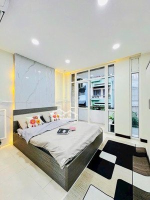 bán nhà 100m2 ,5 tầng, hẻm xe hơi - khu vip đường hồ văn huê , đào duy anh - 19 tỷ nhỉnh