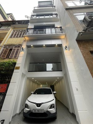 chính chủ bán nhà mặt ngõ hào nam. cách phố 20m. gara oto, 47m2 - 7 tầng thang máy