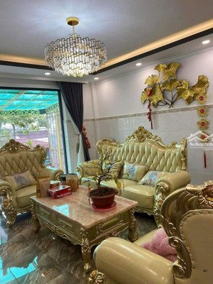 nhà 1 trệt 4 lầu có thang máy - mặt tiền huỳnh văn luỹ - sổ hồng hoàn công