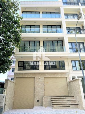 cho thuê tòa nhà văn phòng mới xây 8x20m hầm 5 lầu đường 52 tml