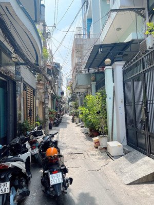 nhà đẹp trung tâm thành thái quận 10 hxh 48m 4 tầng 2 mặt hẻm