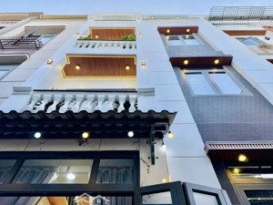 5,5 m x 8 m nhà 4 tầng - khu phân lô - hxh gần cv làng hoa - lê văn thọ