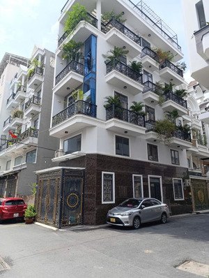 bán nhà góc 2 mặt tiền hoàng hoa thám, p7, bt. 4 tầng, 4.5x18m, hẻm thông xe hơi, giá 14 tỷ tl