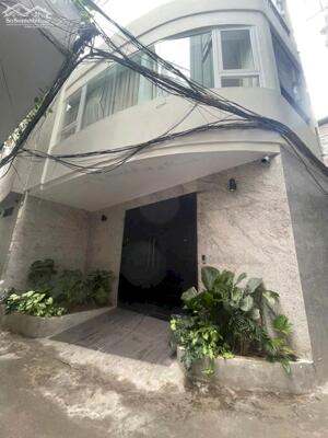 Giảm 3 tỷ cần bán toà nhà dòng tiền 318 La Thành thông sang Hào Nam 11 CHDV cao cấp cho thuê 1,2 tỷ/năm