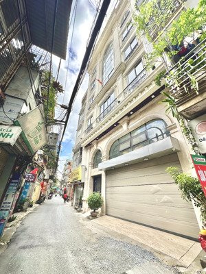 phân lô hoàng văn thái - 55m2 x 6 tầng - lô góc - mặt tiền rộng - gara 2 ô tô - giá: 23.8 tỷ (tl)