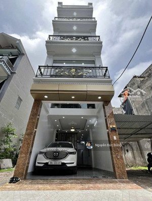 nhà cổ linh 50m2 ,mt 4m, giá 9 tỷ gara oto + thang máy