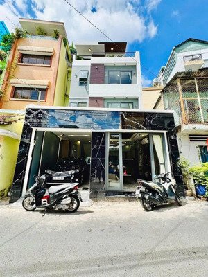 nhà 1trệt-2lầu gần công viên tân thuận giá chỉ 2tỷ960. đường thông xe oto huỳnh tấn phát quận 7