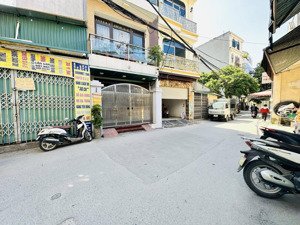 mặt ngõ thông ôtô tránh_xây mới_5 tầng thang máy_ôtô vào nhà_kd sầm uất mọi mặt hàng_nhà đẹp ở ngay