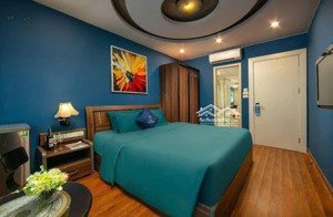 tòa nhà mặt phố trần quốc vượng, cầu giấy - lô góc - vỉa hè - ô tô dừng đỗ - kinh doanh sầm uất