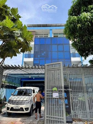 cặp nhà đang làm tòa nhà văn phòng xây 4 tầng mặt tiền đường thạnh xuân 22