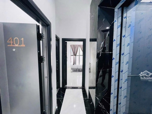 toà ccmn 6 tầng 12 phòng k.kín thang máy mặt tiền rộng lê quang đạo dòng tiền 38tr/tháng