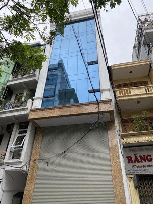 cho thuê tòa nhà mới 100% phố hoàng cầu - đống đa, dt 90m x 6 tầng, thông sàn, thang máy. 57tr