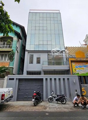 nhà ốp kính, hầm + thang máy 6 tầng kế tòa nhà viettel, quận 10