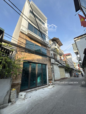 bán nhà phường long biên lô góc 50m2 x 5 tầng ô tô 7 chỗ vào nhà ngõ thông kinh doanh tốt