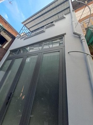 nhà đẹp sát mặt tiền tân phước, p10, 3.6x10m - 1 trệt 2 lầu 4pn