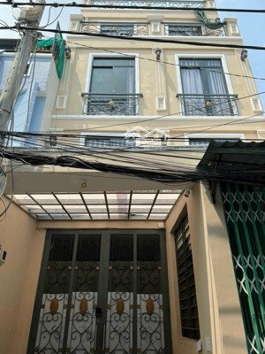 nhà trọ trung tâm quận 7,đường nguyễn thị thập,dt6x15m,3 lầu lh 