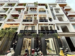 nhà full nội thất, đường tx 25, dt:4x14m, lửng, 3 lầu, 4pn, 6vs, gara ôtô, p.thờ, sân thượng