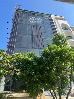 cần bán tòa nhà 7 tầng mặt phố đàm quang trung