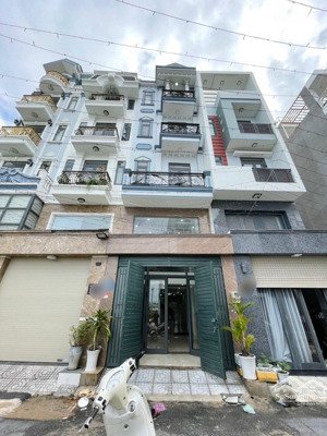 bán nhà hẻm 5m nguyễn văn đậu, vị trí gần mặt tiền đường. dt: 4x15m. nở hậu. xây 5 tầng mới đẹp