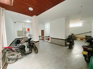 bán toà chdv lô góc phố tây sơn, 50m2x7t thang máy, 13p full nội thâtd. d/thu 90tr/tháng. q.đống đa