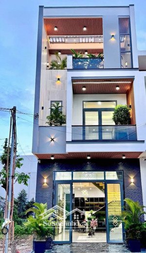 cần bán nhà 1 trệt 2 lầu sổ hồng riêng đang có hợp đồng cho thuê sát chợ