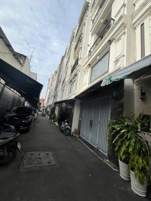 bán nhà bình thạnh 4 tấm ,khu đồng bộ cao tầng hoàng hoa thám, gần chợ cây queó 4x17m. gía 12tỷ3