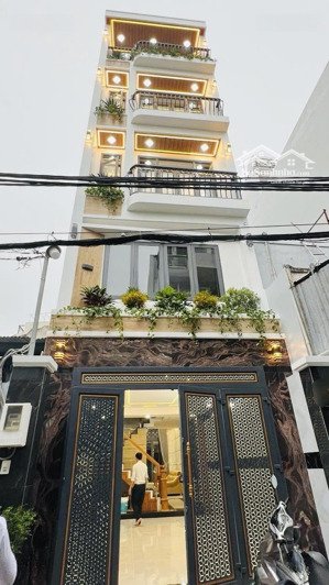 chủ định cư ra nước ngoài bán gấp - nhà 5 tầng - giá 9,4 tỷ - dt 4x20 - hxh thông