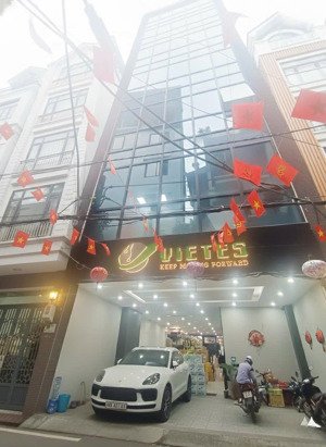 bán nhà 7 tầng thang máy làm văn phòng công ty + ở - phố trung kính - mặt tiền rộng - ô tô tránh