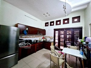 14ty8 thương lượng bán nhà mặt tiền đường nhựa 12m lề đường 3m cách tttm parc 100m