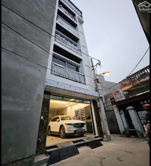 nhà 6 tầng thang máy - lô góc cực sáng - cổ linh thạch bàn -chốn ở lý tưởng để an cư