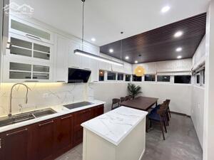 BÁN NHÀ MẶT PHỐ HOA BẰNG 62M² 6.5 TẦNG + PENTHOUSE Ô TÔ TRÁNH KINH DOANH 26.9 TỶ