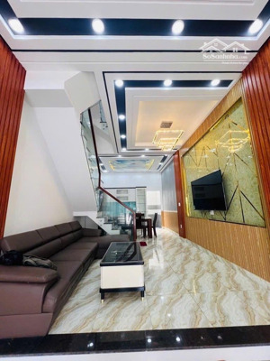 nhà phố 4tầng đường nhựa ô tô tránh khu thesun residene sài gòn mới