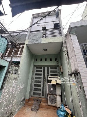 bán nhà chính chủ 1 trệt 1 lầu nở hậu dt 57.76m2, chân cầu tân thuận 1 hướng đi quận 4