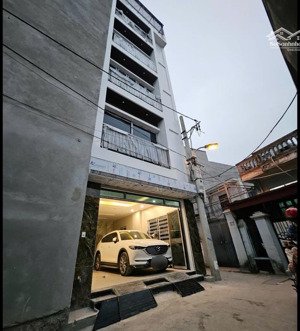 bán căn nhà mới lô góc 6 tầng thang máy ô tô đỗ ngày đêm trung tâm thạch bàn cổ linh