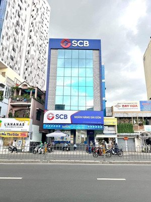 tòa nhà văn phòng - ốp kính | số 56 ngô gia tự q10 | 7x25m | 5 tầng + thang máy|