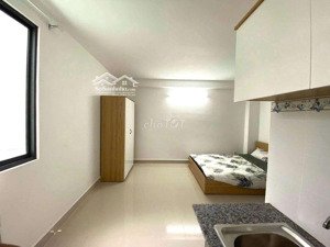 tòa 5 tầng chdv 8 phòng dòng tiền 45tr/th bạch đằng p15 bt giá chỉ 12 tỷ tl,full nội thất,8pn,8wc