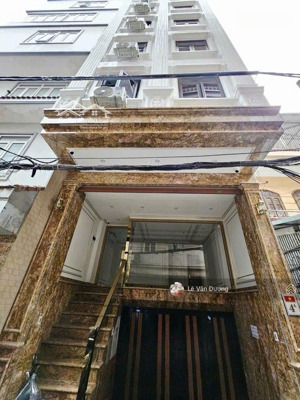 tòa căn hộ dịch vụ phố nguyễn khánh toàn-70m -9 tầng thang máy -có hầm -mặt tiền 5.2m -17phong kín