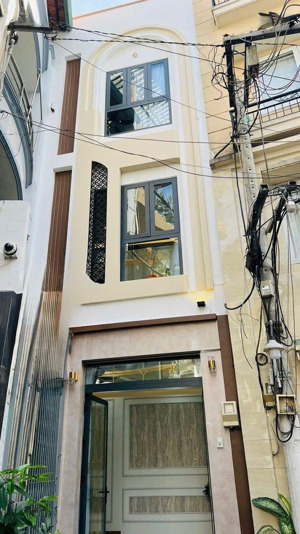 nhà sát mặt tiền hẻm 160 nguyễn duy dương trung tâm q10 dt: 4m x 10m2 4 tỷ 890 1t 2l 4pn