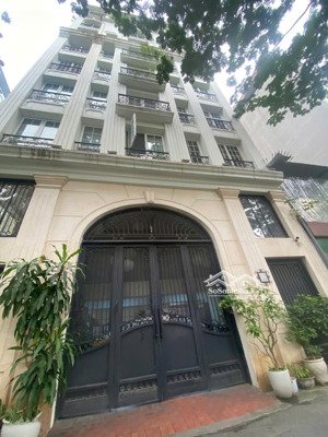 bán tòa nhà 9 tầng -trường chinh 112m2 ô tô 7 chỗ vào nhà 2 mặt ngõ - có vườn và gara - ngay phố